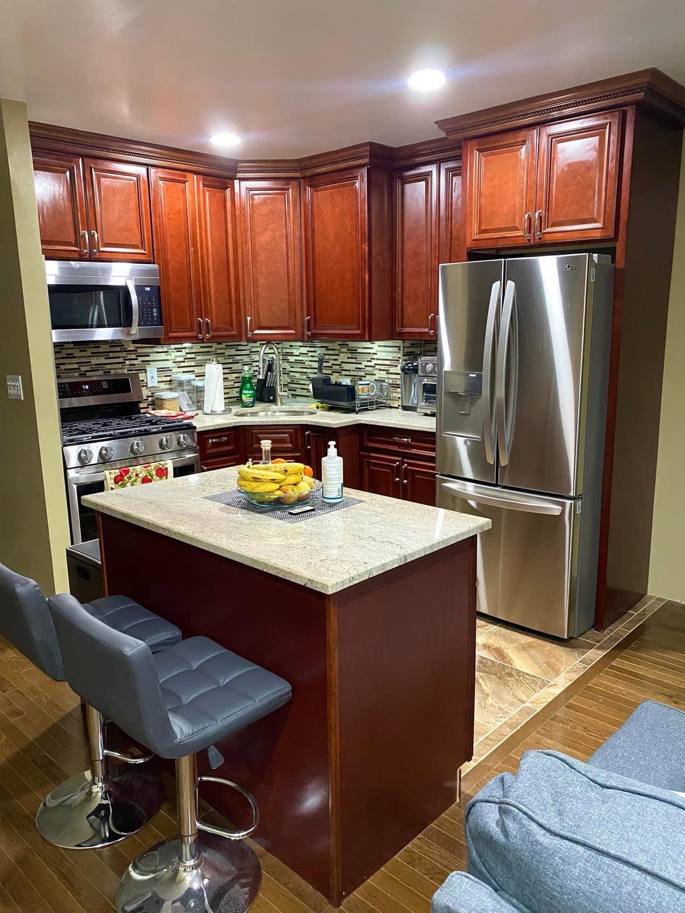 Modern kitchen with island and integrated appliances